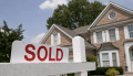 Sold sign outside of a home